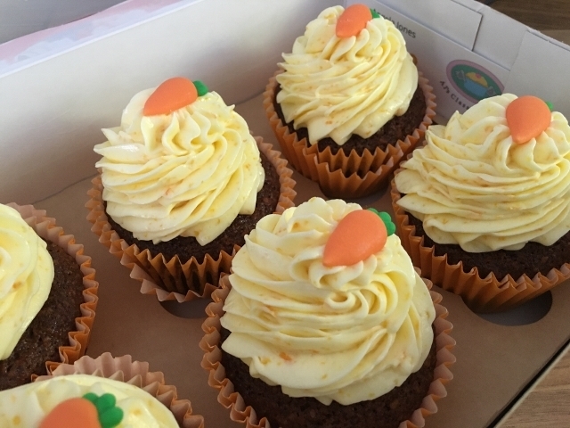 carrot-orange-cupcakes-with-orange-buttercream-in-gift-box.jpg