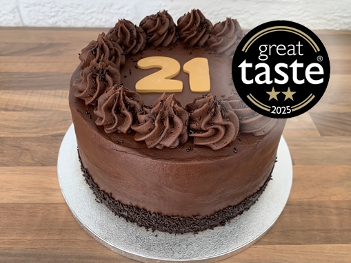 gluten-free-chocolate-fudge-birthday-cake-with-great-taste-logo-august-2025.jpg