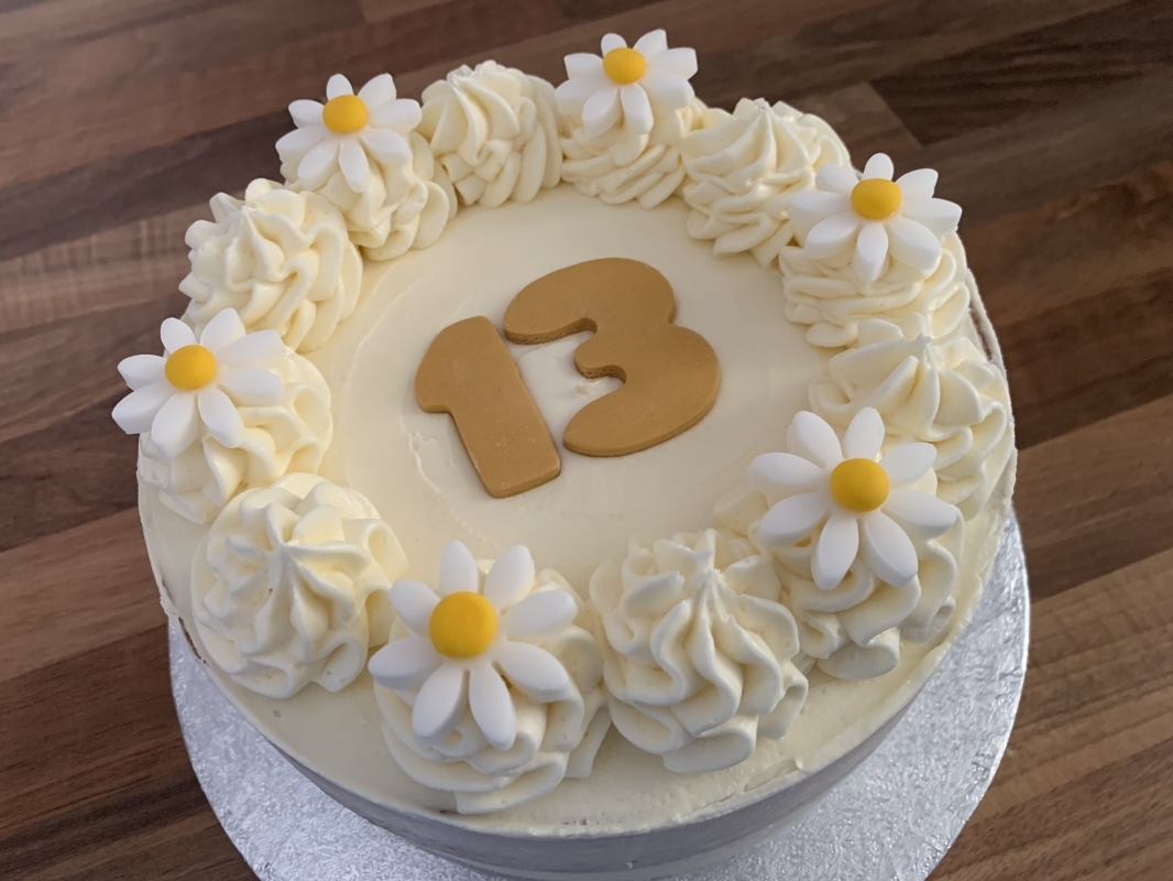 gluten-free-lemon-celebration-cake-with-white-daisies-and-number-13-may-2025-5-001.jpeg