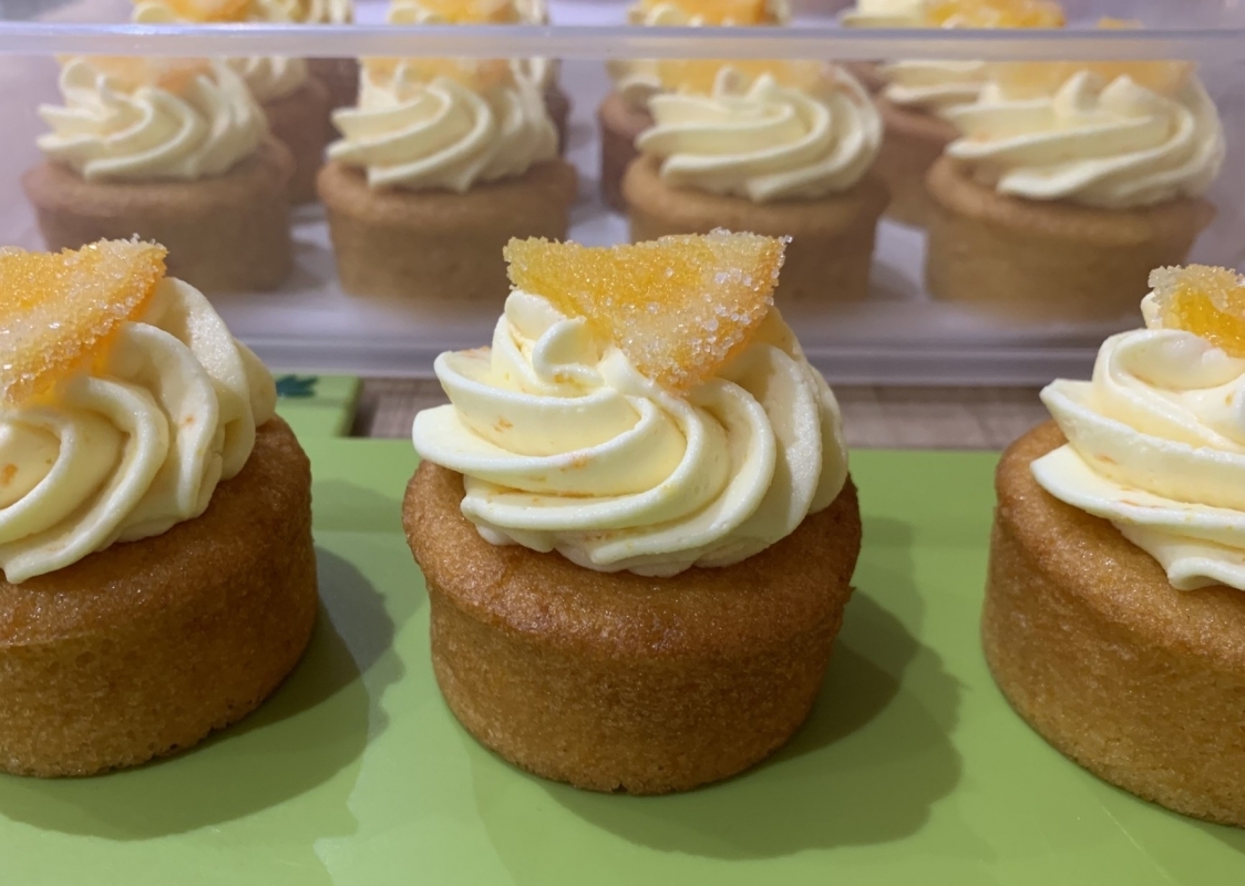 gluten-free-orange-mini-cakes-with-orange-frosting-and-candied-orange-decoration-february-2025-3.jpg